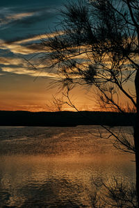 Scenic view of lake during sunset