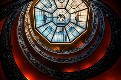 Low angle view of spiral staircase in building