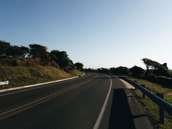 Road against clear sky