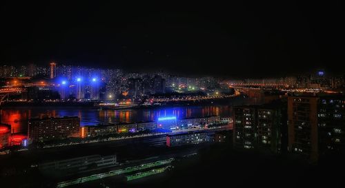 Illuminated cityscape at night