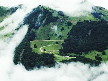 Aerial view of clouds over mountains