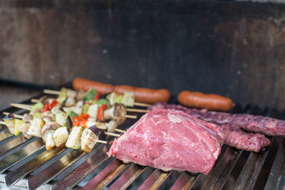 Close-up of meat on barbecue grill