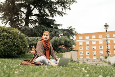 Muslim woman using a computer