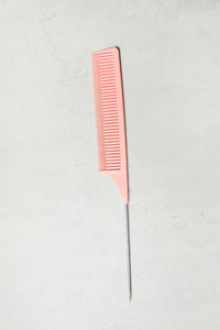 High angle view of pencil on table against white background