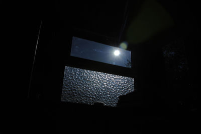 Low angle view of illuminated window