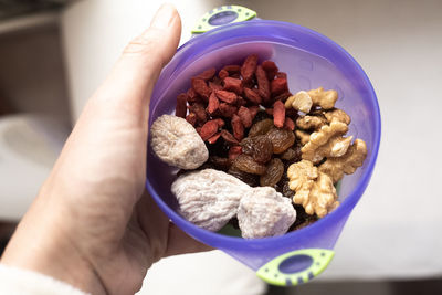 Close-up of hand holding food