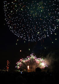 Firework display at night