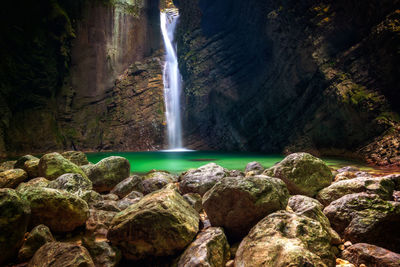 Scenic view of waterfall in forest