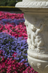 Close-up of statue against white wall