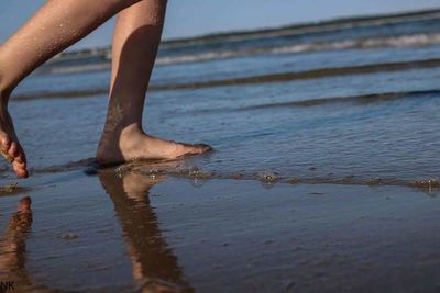 Low section of man on beach