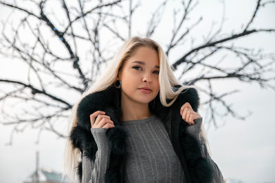 Portrait of a beautiful young woman in winter
