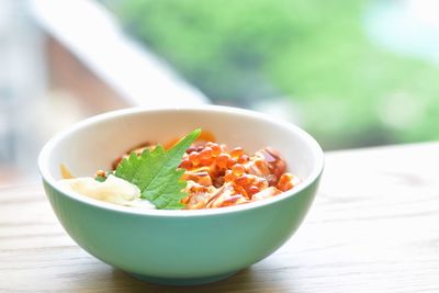 Close-up of salad in bowl on table