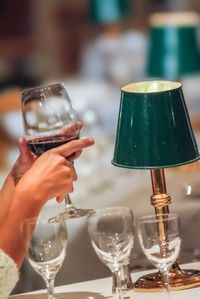 Close-up of hand holding wineglass