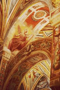 Low angle view of carvings on ceiling in temple