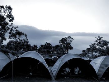 View of tent on mountain against sky