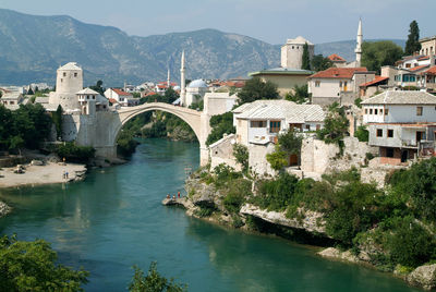 Bridge over river in town