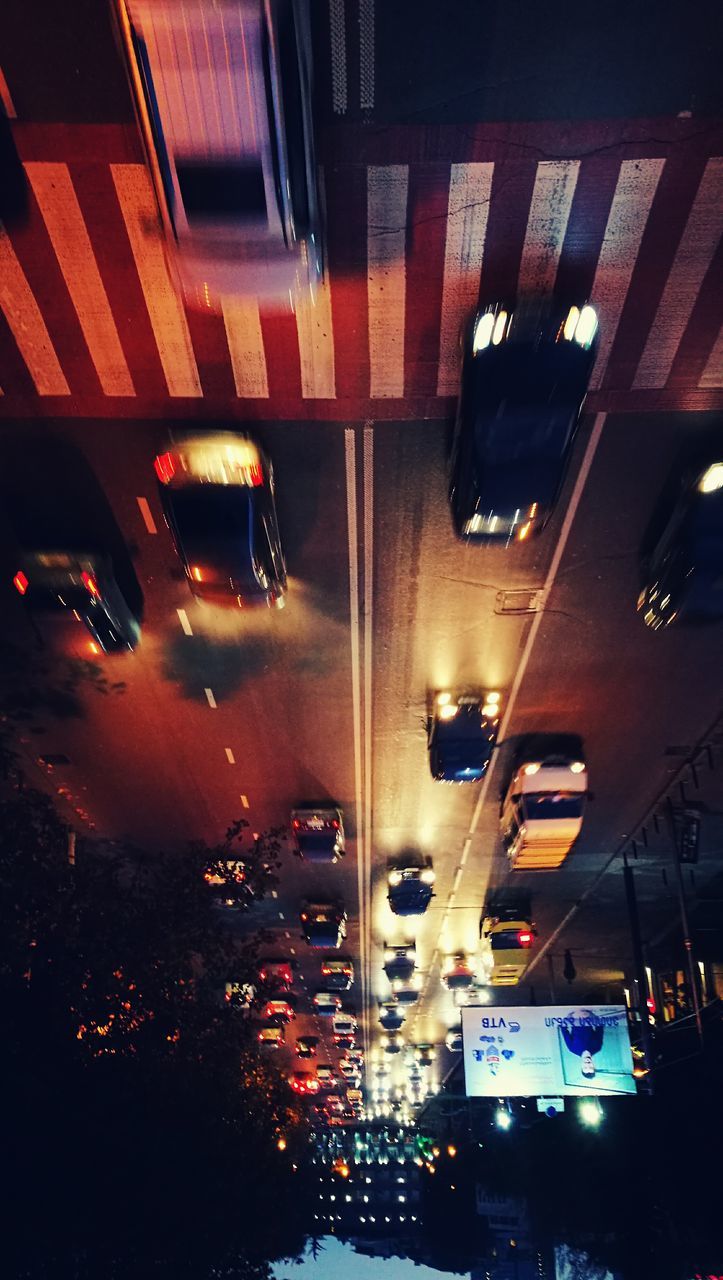 CARS MOVING IN ILLUMINATED UNDERGROUND STATION