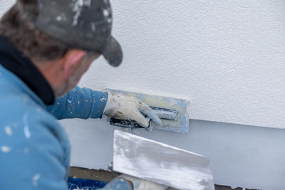 Low section of man working at construction site