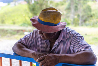 Portrait of man wearing hat