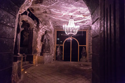 Illuminated entrance of old building