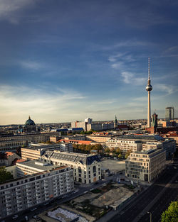 High angle view of buildings in city against sky