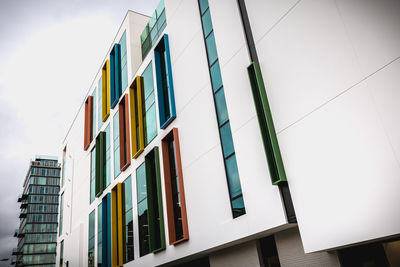 Low angle view of modern building against clear sky