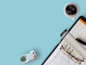 High angle view of coffee cup on table