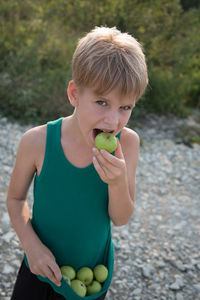 Portrait of boy holding ice cream