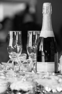 Close-up of wine bottles on table