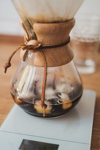 Close-up of iced coffee drink in glass on table