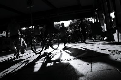 People on bicycle in city