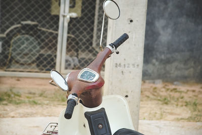 Close-up of bicycle on road