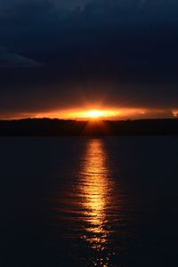 Scenic view of sunset over river
