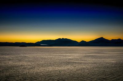 Scenic view of mountains at sunset