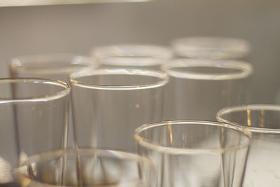 Close-up of empty glasses on table