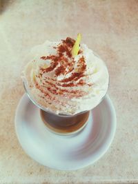 Close-up of cappuccino on table