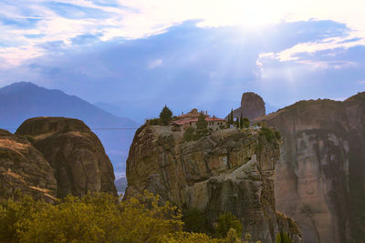 Panoramic view of rocks and mountains against sky