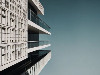 Low angle view of building against clear blue sky