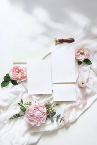 Close-up of roses in pot on table