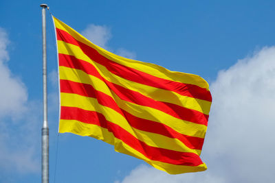 Catalan flag waving against sky