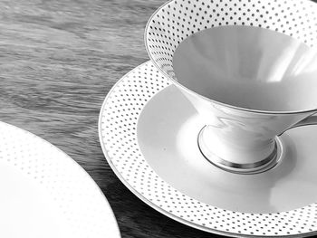 High angle view of coffee cup on table