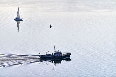 High angle view of sailboat sailing on sea