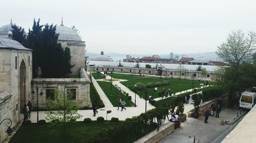 Panoramic view of people against sky