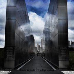 View of bridge against cloudy sky