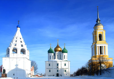 Low angle view of bell tower against sky