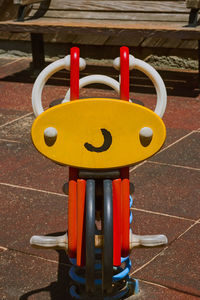 Close-up of yellow toy in playground
