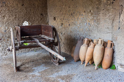 Empty chairs against wall