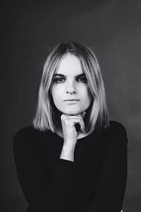 Portrait of young woman looking away