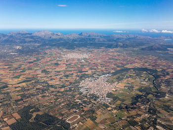 Aerial view of city against sky