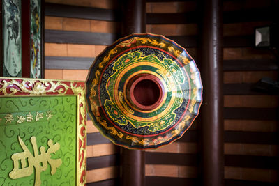 Close-up of multi colored chairs on table